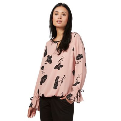 Pale pink floral print flute sleeve blouse